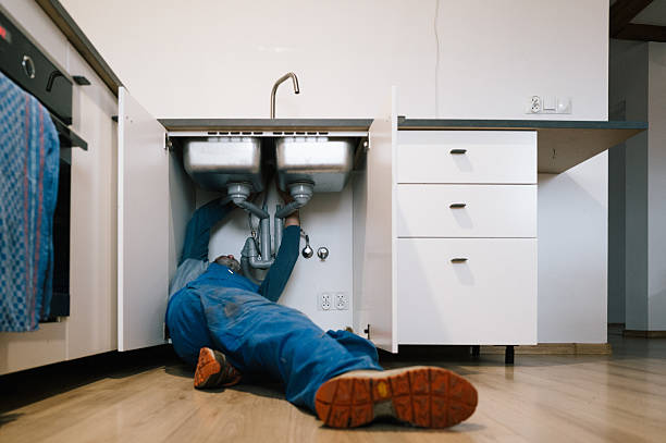 Professional Emergency Plumber technician working in Lawtey, FL